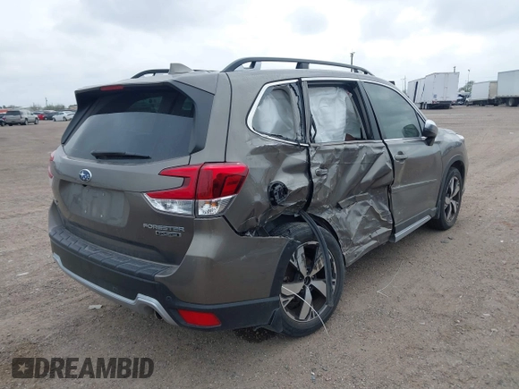 2021 Subaru Forester Touring with VIN JF2SKAXC9MH556986, listed as a IAAI auction lot 41717748 with 33,573 mi miles. Bid and sale history available at carsss.com. Image 4.