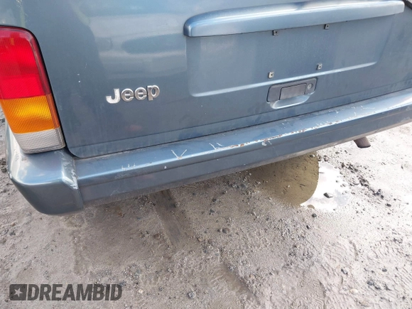 1998 Jeep Cherokee Sport with VIN 1J4FT68S0WL125382, listed as a IAAI auction lot 41551866 with 1 mi miles. Bid and sale history available at carsss.com. Image 6.