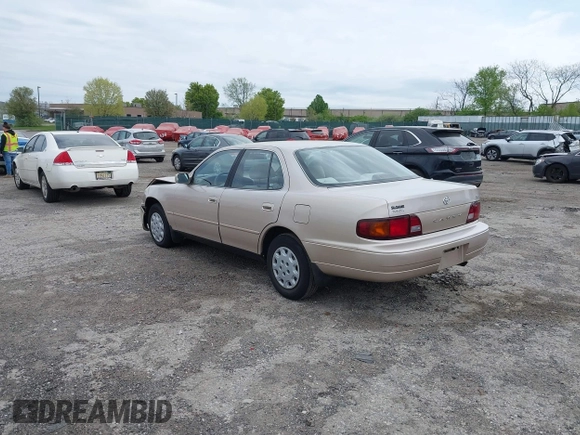 1996 Toyota Camry DX with VIN 4T1BG12K7TU813773, listed as a IAAI auction lot 42084977 with 49,453 mi miles. Bid and sale history available at carsss.com. Image 3.