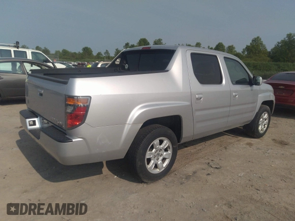 2007 Honda Ridgeline RTL z VIN 2HJYK16537H501200, wystawiony jako IAAI lot #42425662 z przebiegiem 188 618 mil mil oraz . Historia ofert i sprzedaży dostępna na DreamBid. Obrazek 4.