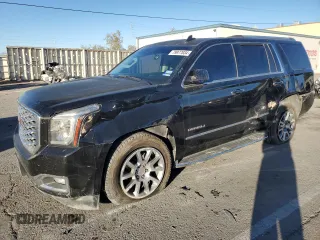 2018 GMC Yukon Denali with VIN 1GKS1CKJ0JR106589, listed as a Copart auction lot 79977034 with 98,022 mi miles and Salvage Title. Bid and sale history available at carsss.com. Image 1.