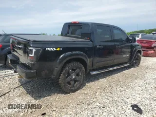 2015 Nissan Titan SL with VIN 1N6AA0EC4FN511210, listed as a Copart auction lot 58762265 with 89,561 mi miles and Clean title. Bid and sale history available at DreamBid. Image 3.