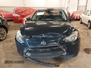 2016 Scion iA z VIN 3MYDLBZV5GY103533, wystawiony jako IAAI lot #41756270 z przebiegiem 59 290 mil mil oraz . Historia ofert i sprzedaży dostępna na DreamBid. Obrazek 12.