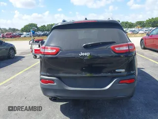 2015 Jeep Cherokee Latitude with VIN 1C4PJLCB4FW683904, listed as a IAAI auction lot 41579059 with 126,156 mi miles and . Bid and sale history available at carsss.com. Image 16.