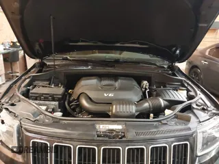 2015 Jeep Grand Cherokee Limited with VIN 1C4RJFBG8FC910133, listed as a IAAI auction lot 41289929 with 141,226 mi miles. Bid and sale history available at carsss.com. Image 10.