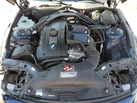 2011 BMW Z4 sDrive35is with VIN WBALM1C56BE393858, listed as a Copart auction lot 74249954 with Not provided miles and Salvage title. Bid and sale history available at DreamBid. Image 11.