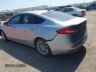 2020 Ford Fusion SE z VIN 3FA6P0HD9LR231471, wystawiony jako IAAI lot #41986473 z przebiegiem 58 587 mil mil oraz . Historia ofert i sprzedaży dostępna na DreamBid. Obrazek 3.