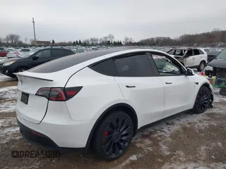 2021 Tesla Model Y Performance with VIN 5YJYGDEF6MF261711, listed as a IAAI auction lot 41176208 with 25,687 mi miles and . Bid and sale history available at DreamBid. Image 4.