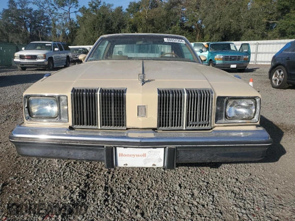 1979 Oldsmobile Cutlass with VIN 3M47P9G419256, listed as a Copart auction lot 80052304 with 86,268 mi miles and Salvage Title. Bid and sale history available at DreamBid. Image 5.