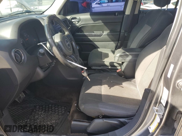 2013 Jeep Patriot Latitude with VIN 1C4NJPFA3DD168869, listed as a Copart auction lot 43795155 with 216,946 mi miles and Clean Title. Bid and sale history available at carsss.com. Image 7.