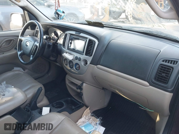 2003 Mazda Tribute ES with VIN 4F2CZ96183KM35719, listed as a IAAI auction lot 40611399 with 136,374 mi miles. Bid and sale history available at carsss.com. Image 5.