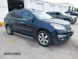 2016 Chevrolet Traverse LTZ z VIN 1GNKVJKD0GJ100532, wystawiony jako IAAI lot #41869714 z przebiegiem 104 823 mil mil oraz . Historia ofert i sprzedaży dostępna na DreamBid. Obrazek 1.