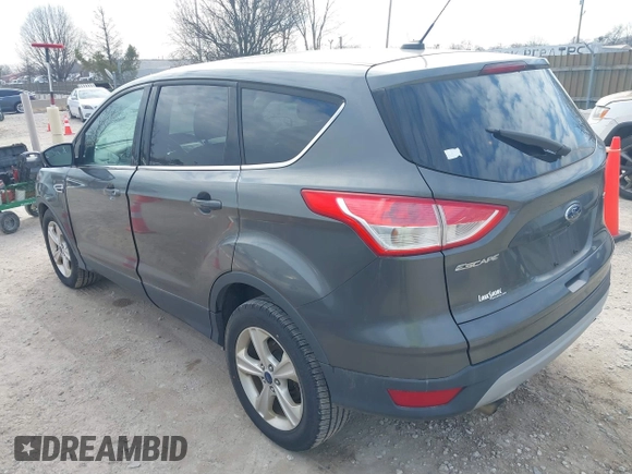 2015 Ford Escape SE with VIN 1FMCU0G76FUC75566, listed as a IAAI auction lot 41896028 with 207,656 mi miles. Bid and sale history available at carsss.com. Image 3.