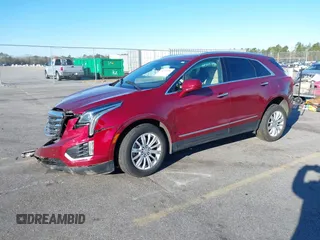 2018 Cadillac XT5 FWD with VIN 1GYKNARS4JZ211455, listed as a IAAI auction lot 41257536 with 102,032 mi miles and . Bid and sale history available at DreamBid. Image 2.
