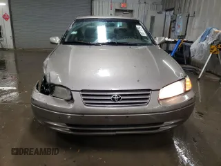 1999 Toyota Camry LE с VIN 4T1BG22K4XU469265, выставлен на аукционе Copart как лот 80112794 с пробегом 184 782 миль миль и Списание • Salvage title. История ставок и продаж доступна на DreamBid. Изображение 5.