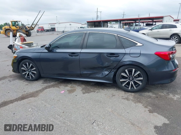 2023 Honda Civic EX with VIN 2HGFE1F73PH312228, listed as a IAAI auction lot 42185408 with 19,339 mi miles and . Bid and sale history available at DreamBid. Image 14.