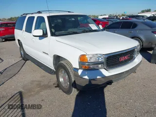 2001 GMC Yukon XL SLT with VIN 3GKEC16TX1G265630, listed as a IAAI auction lot 40869322 with 284,692 mi miles. Bid and sale history available at carsss.com. Image 1.