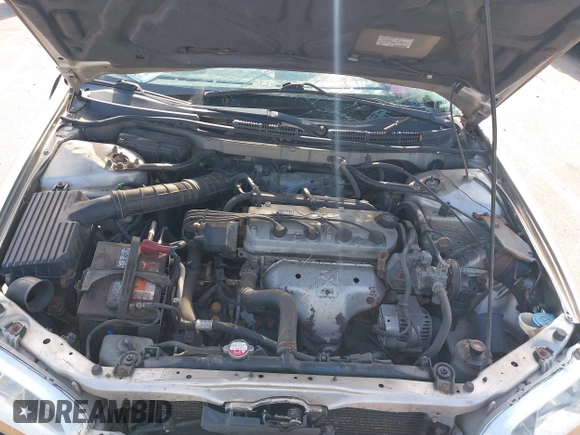 1998 Honda Accord LX z VIN 1HGCG5642WA268665, wystawiony jako IAAI lot #42183420 z przebiegiem 254 417 mil mil oraz . Historia ofert i sprzedaży dostępna na DreamBid. Obrazek 10.
