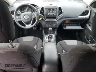 2016 Jeep Cherokee Sport z VIN 1C4PJLAS4GW329112, wystawiony jako Copart lot #89201565 z przebiegiem 163 854 mil mil oraz Szkoda całkowita • Salvage title. Historia ofert i sprzedaży dostępna na DreamBid. Obrazek 8.