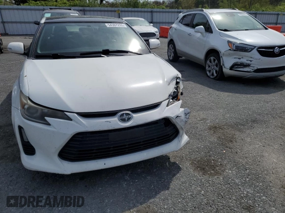 2014 Scion tC z VIN JTKJF5C70E3084697, wystawiony jako Copart lot #54307295 z przebiegiem 174 073 mil mil oraz Szkoda całkowita • Salvage title. Historia ofert i sprzedaży dostępna na DreamBid. Obrazek 5.