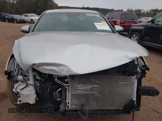 2019 Kia Optima LX z VIN 5XXGT4L34KG332883, wystawiony jako IAAI lot #41389571 z przebiegiem 54 280 mil mil oraz . Historia ofert i sprzedaży dostępna na DreamBid. Obrazek 6.