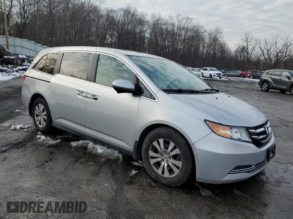 2014 Honda Odyssey EX-L with VIN 5FNRL5H69EB063028, listed as a Copart auction lot 43431935 with 118,426 mi miles and Salvage Title. Bid and sale history available at DreamBid. Image 4.