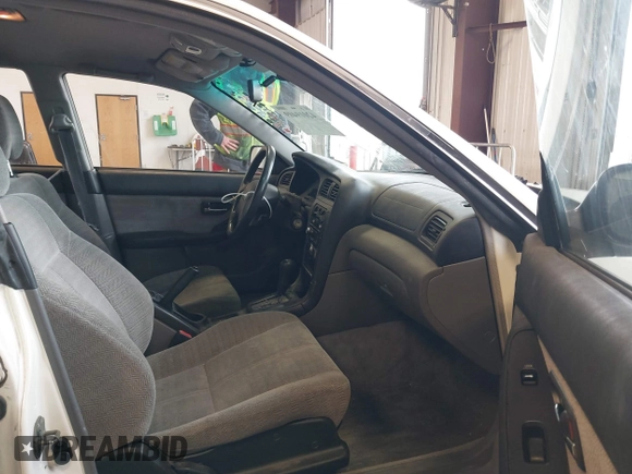 2000 Subaru Legacy L with VIN 4S3BE6352Y7213443, listed as a IAAI auction lot 42019409 with 208,785 mi miles and . Bid and sale history available at DreamBid. Image 5.