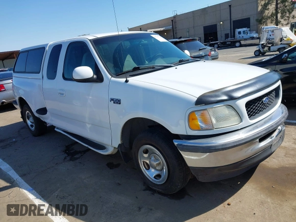 1998 Ford F-150 XL with VIN 1FTZX072XWKA12003, listed as a IAAI auction lot 41765328 with 119,445 mi miles and . Bid and sale history available at DreamBid. Image 1.