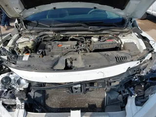 2020 Honda Civic LX z VIN 2HGFC2F68LH565560, wystawiony jako IAAI lot #41517853 z przebiegiem 96 832 mil mil oraz . Historia ofert i sprzedaży dostępna na DreamBid. Obrazek 10.