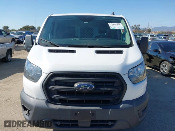 2020 Ford Transit Cargo with VIN 1FTBR1Y83LKA67103, listed as a IAAI auction lot 42408599 with 76,837 mi miles and . Bid and sale history available at DreamBid. Image 12.