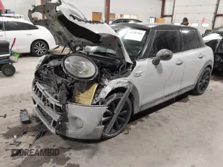 2015 MINI Hardtop 4 Door S with VIN WMWXU3C56F2B66449, listed as a IAAI auction lot 41296784 with 53,589 mi miles and . Bid and sale history available at DreamBid. Image 2.
