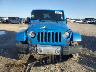 2011 Jeep Wrangler Sahara with VIN 1J4GA5D15BL632709, listed as a Copart auction lot 84118104 with 87,644 mi miles and Salvage Title. Bid and sale history available at DreamBid. Image 5.