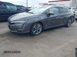 2019 Honda Clarity Plug-In Hybrid with VIN JHMZC5F18KC006818, listed as a IAAI auction lot 41905854 with 85,135 mi miles. Bid and sale history available at carsss.com. Image 2.