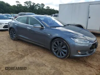 2013 Tesla Model S с VIN 5YJSA1CG6DFP21533, выставлен на аукционе Copart как лот 60850815 с пробегом 24 220 миль миль и На запчасти • Non repairable. История ставок и продаж доступна на DreamBid. Изображение 4.