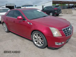 2012 Cadillac CTS Premium z VIN 1G6DP5E3XCO112356, wystawiony jako IAAI lot #42361406 z przebiegiem 121 753 mil mil oraz . Historia ofert i sprzedaży dostępna na DreamBid. Obrazek 1.
