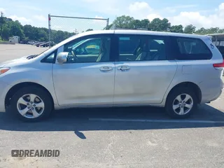 2014 Toyota Sienna L with VIN 5TDZK3DC9ES518653, listed as a IAAI auction lot 42767591 with 261,730 mi miles and . Bid and sale history available at DreamBid. Image 14.