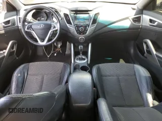 2013 Hyundai Veloster w/Gray Int z VIN KMHTC6AD9DU138719, wystawiony jako Copart lot #57494735 z przebiegiem 149 255 mil mil oraz Szkoda całkowita • Salvage title. Historia ofert i sprzedaży dostępna na DreamBid. Obrazek 8.