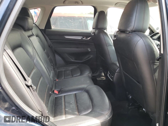 2020 Mazda CX-5 Grand Touring with VIN JM3KFBDM0L0767634, listed as a Copart auction lot 54433935 with 57,901 mi miles and Salvage Title. Bid and sale history available at carsss.com. Image 11.