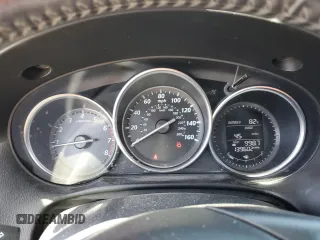 2015 Mazda CX-5 Touring with VIN JM3KE2CY5F0548826, listed as a Copart auction lot 52686565 with 139,602 mi miles and Salvage Title. Bid and sale history available at carsss.com. Image 9.