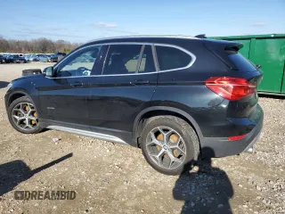 2017 BMW X1 xDrive28i with VIN WBXHT3C35H5F68640, listed as a Copart auction lot 85563114 with 103,480 mi miles and Salvage Title. Bid and sale history available at carsss.com. Image 2.