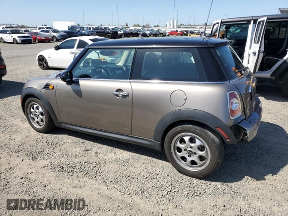 2013 MINI Hardtop with VIN WMWSU3C57DT678736, listed as a Copart auction lot 52586285 with 64,563 mi miles and Salvage Title. Bid and sale history available at DreamBid. Image 2.