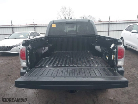 2022 Toyota Tacoma 4WD SR with VIN 3TMCZ5AN4NM476170, listed as a IAAI auction lot 41482149 with 57,126 mi miles. Bid and sale history available at carsss.com. Image 16.