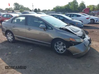 2006 Honda Civic LX z VIN 1HGFA16566L042679, wystawiony jako IAAI lot #42398299 z przebiegiem 172 356 mil mil oraz . Historia ofert i sprzedaży dostępna na DreamBid. Obrazek 1.