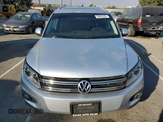 2013 Volkswagen Tiguan S with VIN WVGAV7AX8DW501081, listed as a Copart auction lot 88065365 with 157,312 mi miles and Salvage title. Bid and sale history available at DreamBid. Image 5.