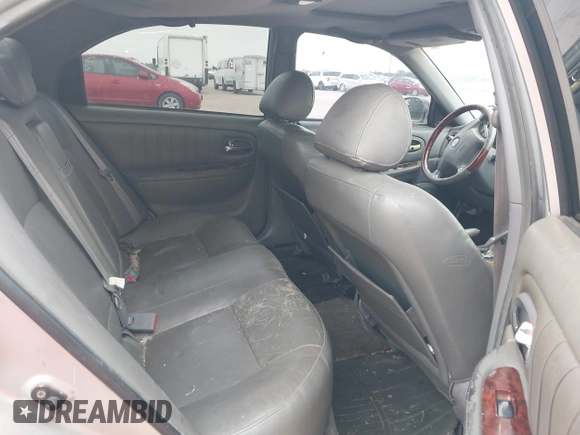 2003 Kia Optima LX z VIN KNAGD128235248556, wystawiony jako IAAI lot #42366002 z przebiegiem 140 904 mil mil oraz . Historia ofert i sprzedaży dostępna na DreamBid. Obrazek 8.