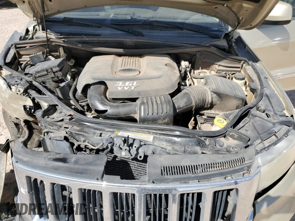 2012 Jeep Grand Cherokee Laredo with VIN 1C4RJEAG7CC125383, listed as a Copart auction lot 51180845 with 0 mi miles and Salvage Title. Bid and sale history available at carsss.com. Image 12.