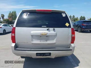 2007 Chevrolet Suburban LS with VIN 1GNFC16027J202168, listed as a IAAI auction lot 42100210 with Not Provided miles and . Bid and sale history available at DreamBid. Image 16.