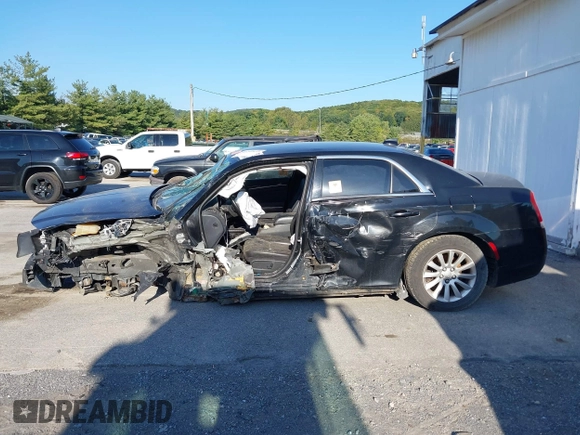 2015 Chrysler 300 Limited with VIN 2C3CCAAGXFH779843, listed as a IAAI auction lot 40284433 with 251,182 mi miles and . Bid and sale history available at DreamBid. Image 15.