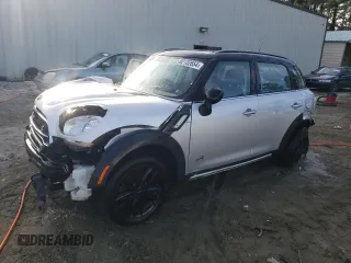 2016 MINI Countryman S with VIN WMWZC5C55GWU22112, listed as a Copart auction lot 82132654 with 60,210 mi miles and Salvage Title. Bid and sale history available at DreamBid. Image 1.