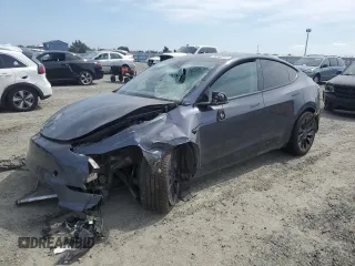 2021 Tesla Model Y Performance with VIN 5YJYGDEF2MF262273, listed as a Copart auction lot 50569245 with 90,879 mi miles and Salvage Title. Bid and sale history available at DreamBid. Image 1.